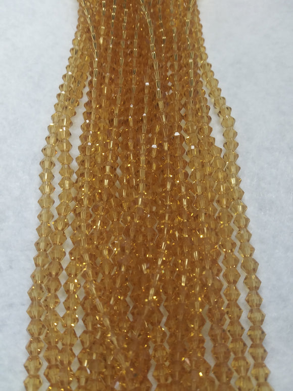 beads bicone 4mm clear golden yellow
