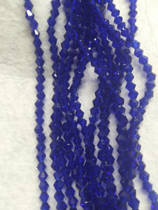 beads bicone 4mm clear dark blue