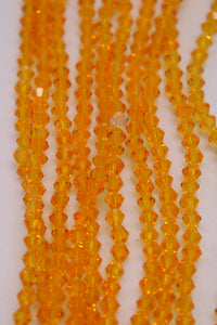beads bicone 4mm clear light orange