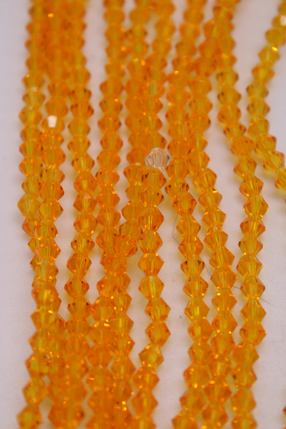 beads bicone 4mm clear light orange