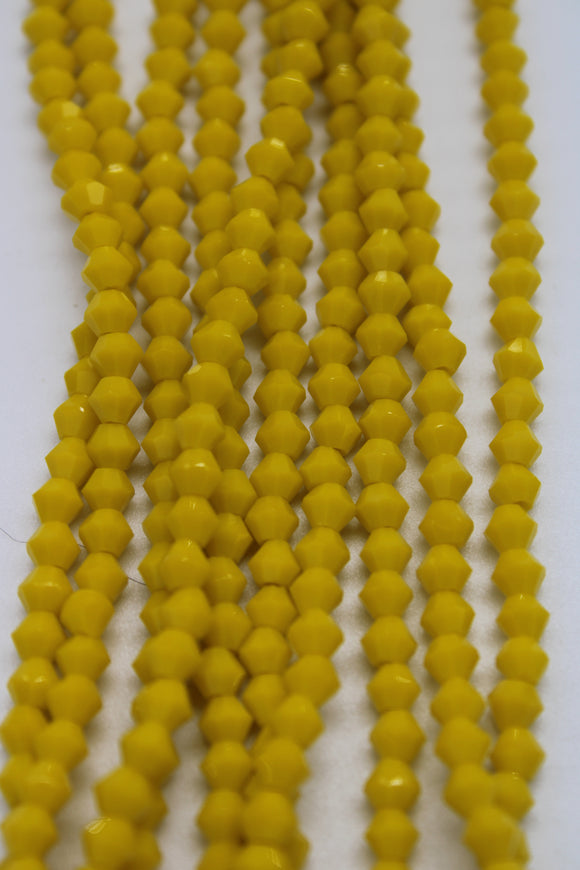 beads bicone 4mm opaque dark yellow