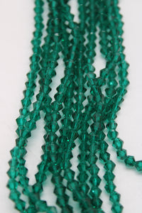 beads bicone 4mm clear emerald green