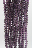 beads bicone 4mm clear dark amethyst
