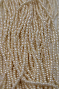 Czech size 11 pearl finish light eggshell