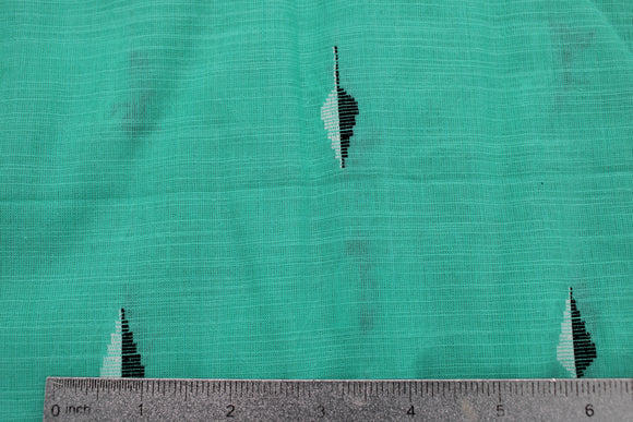 turquoise green slub cotton with embroidered leaf design