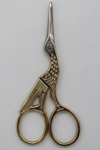 scissors bird gold color
